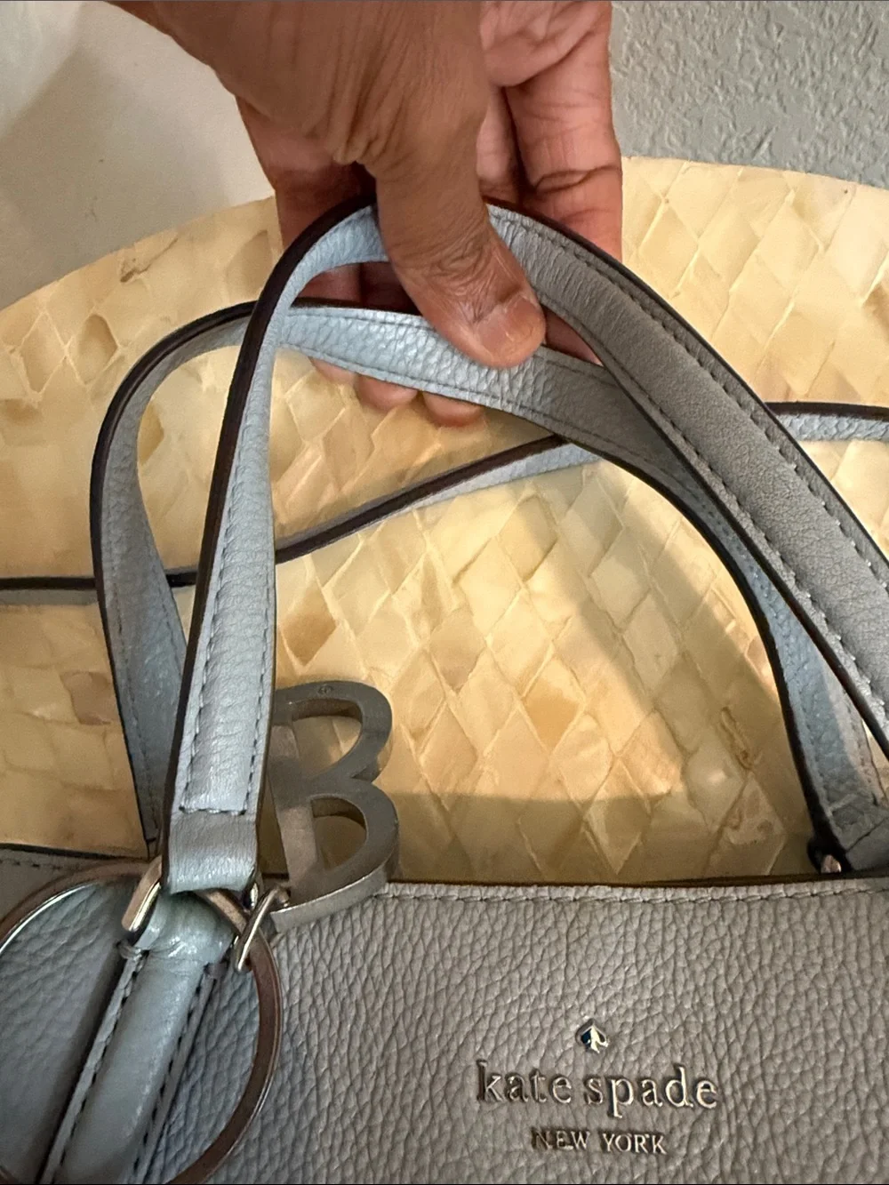 Kate Spade pale blue pebbled leather satchel with charm